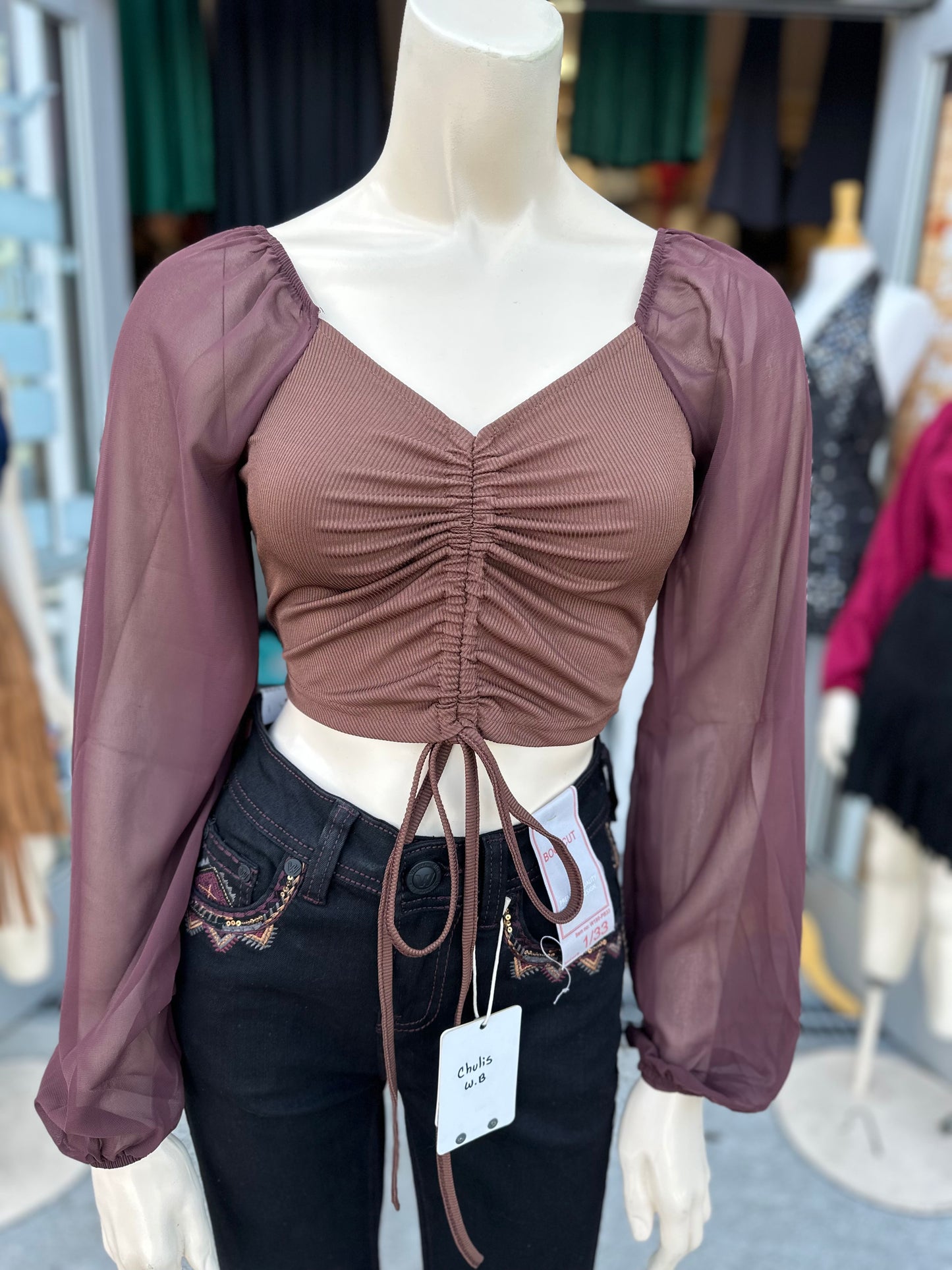 Nayeli’s brown top