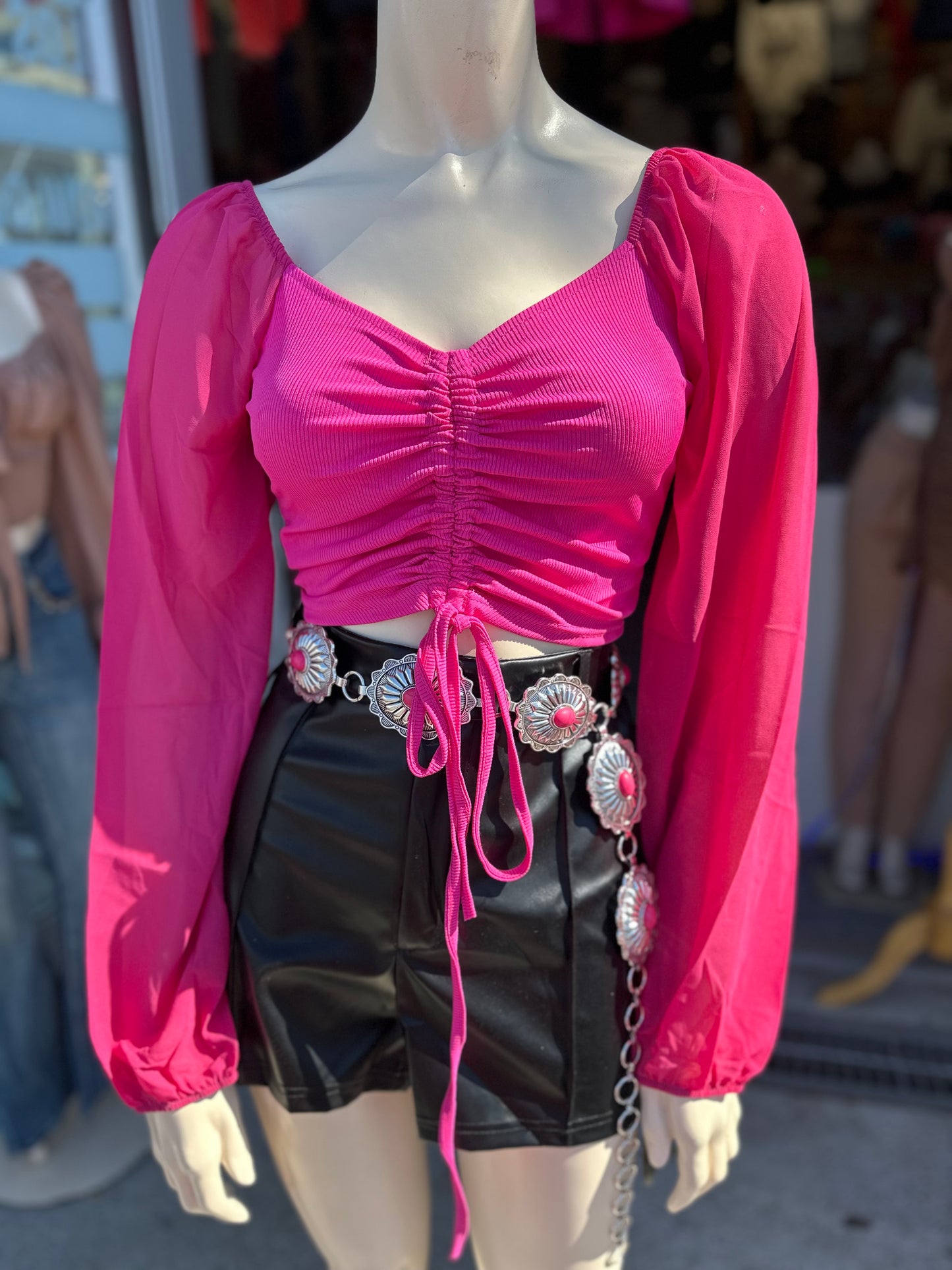 Nayeli’s hot pink top