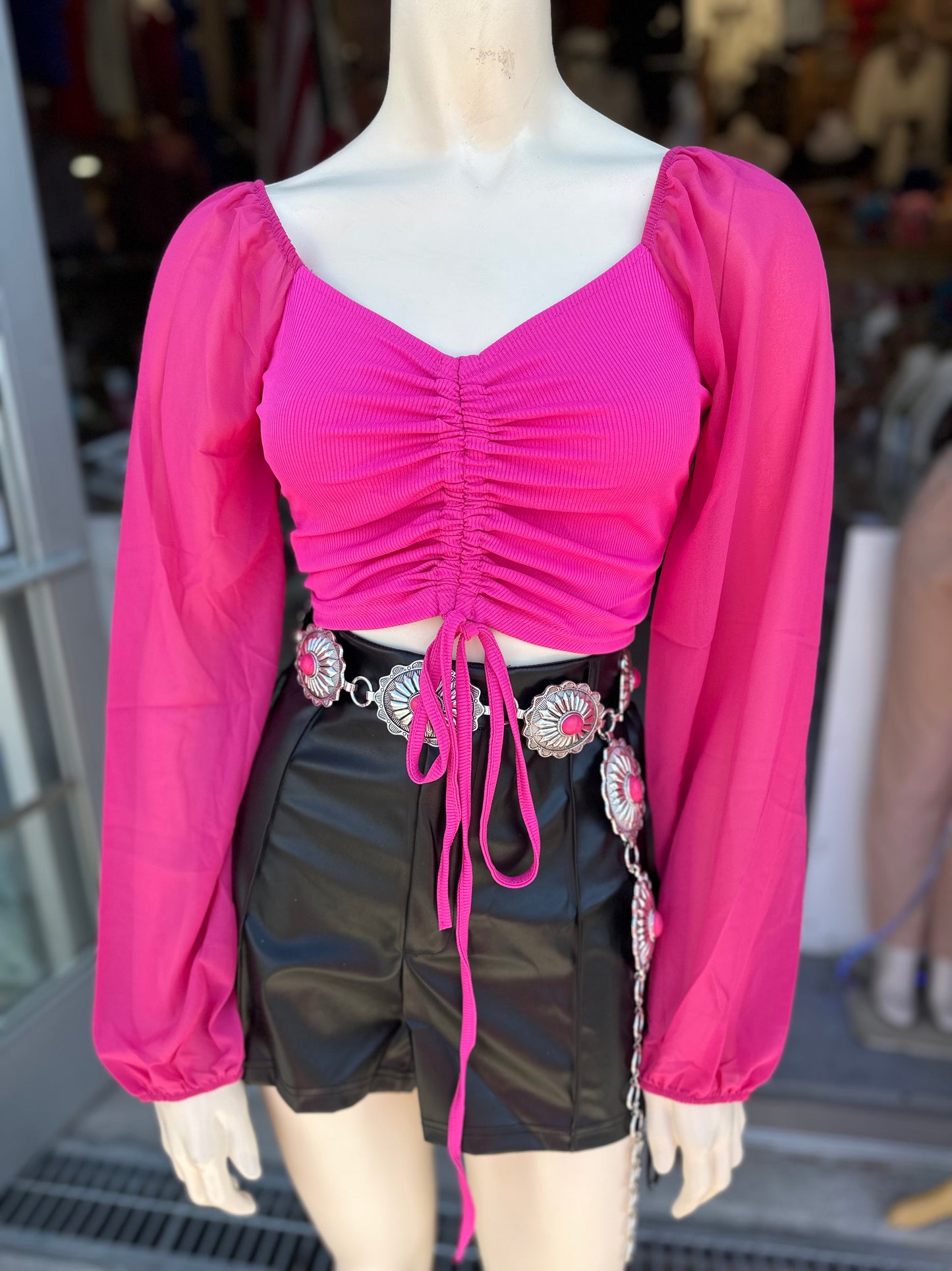 Nayeli’s hot pink top