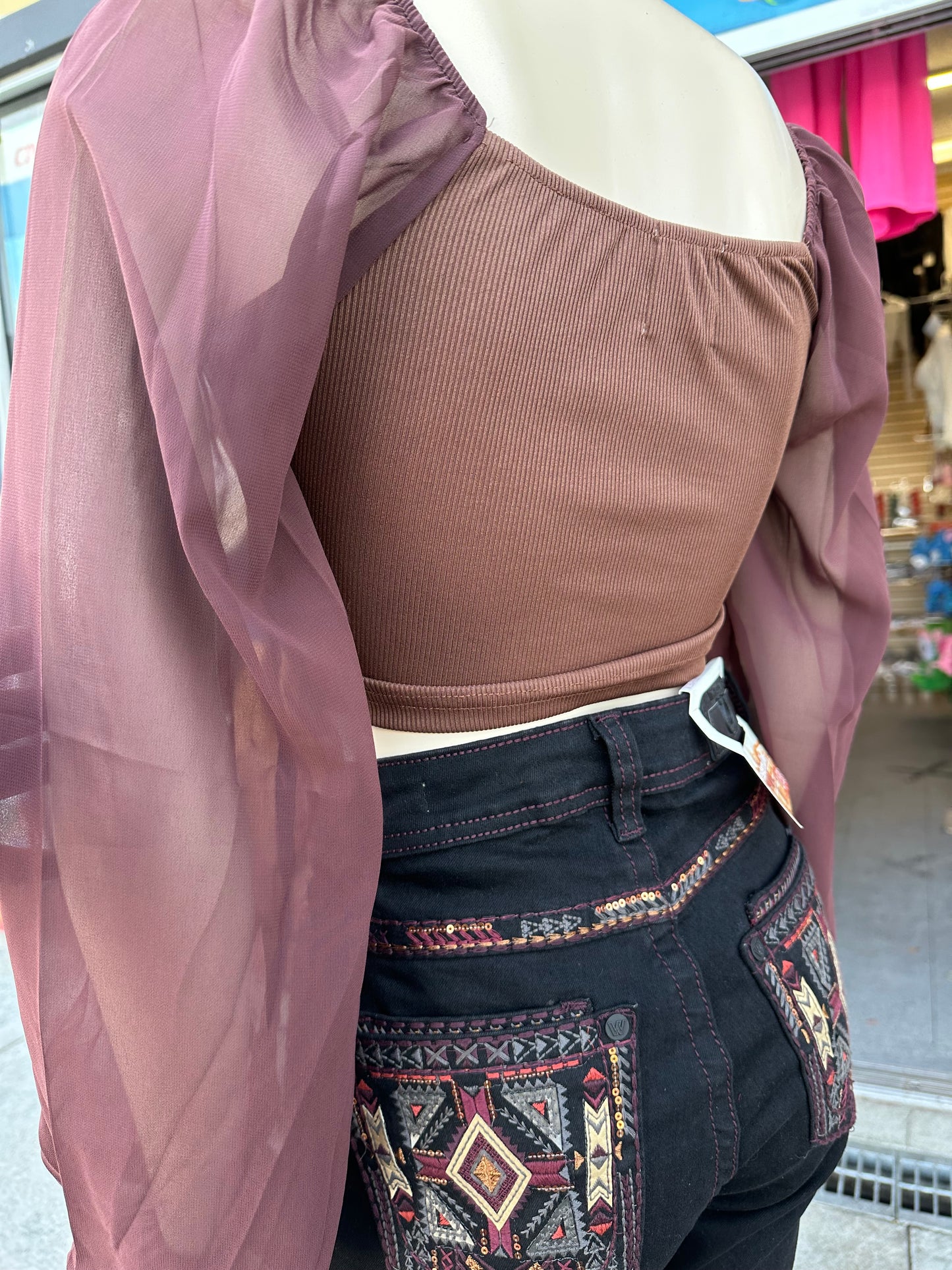 Nayeli’s brown top