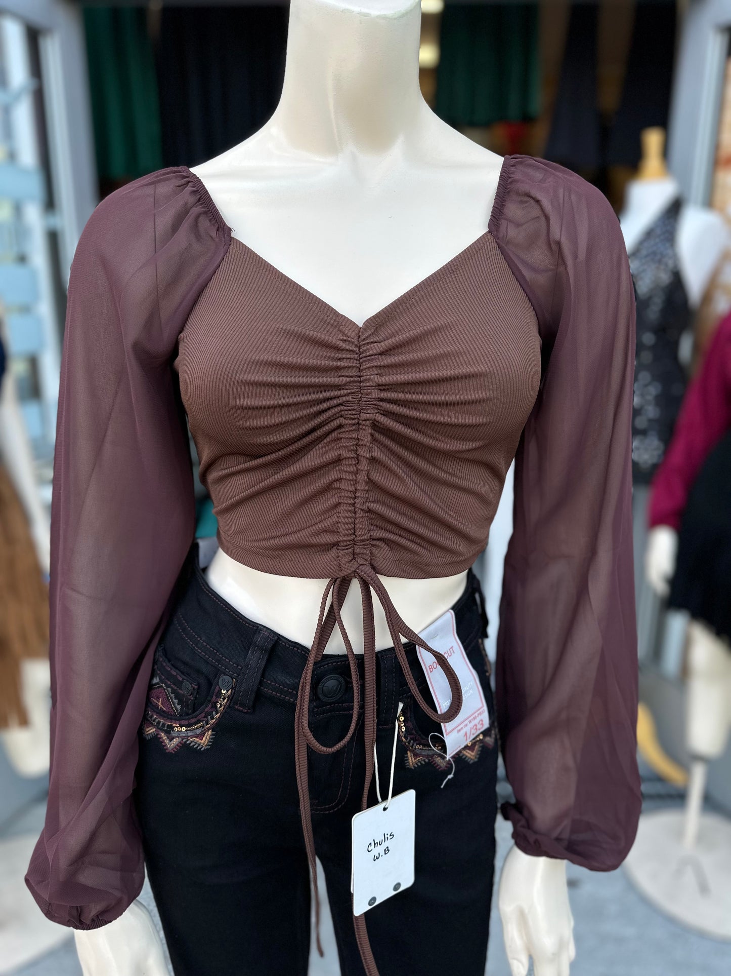 Nayeli’s brown top