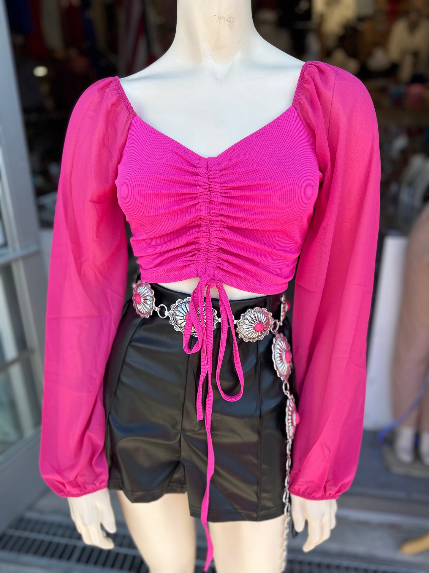 Nayeli’s hot pink top