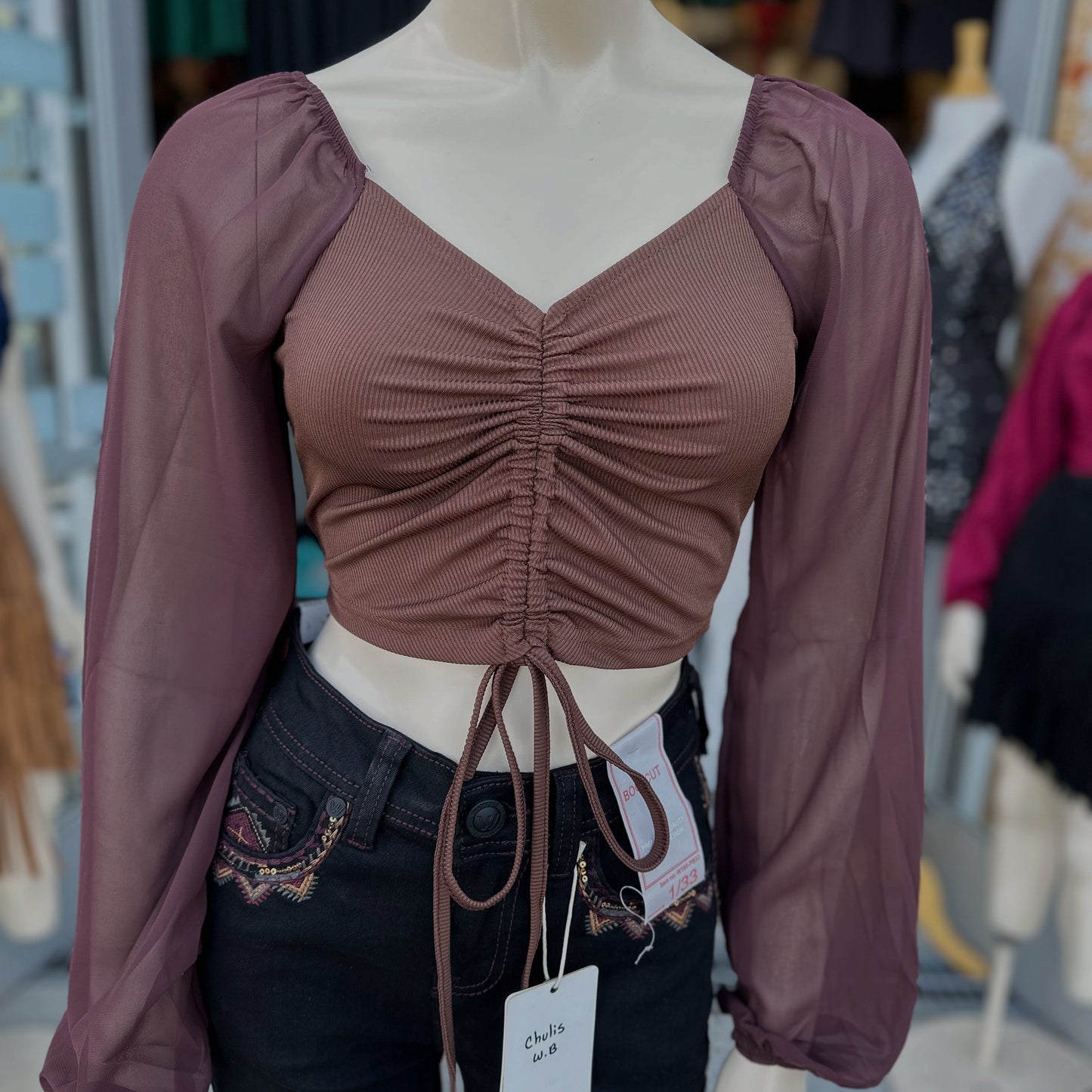 Nayeli’s brown top