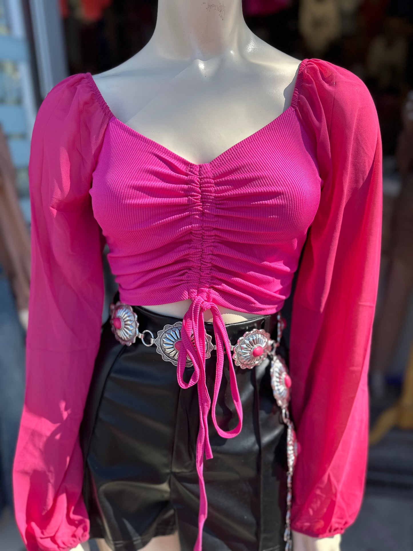 Nayeli’s hot pink top