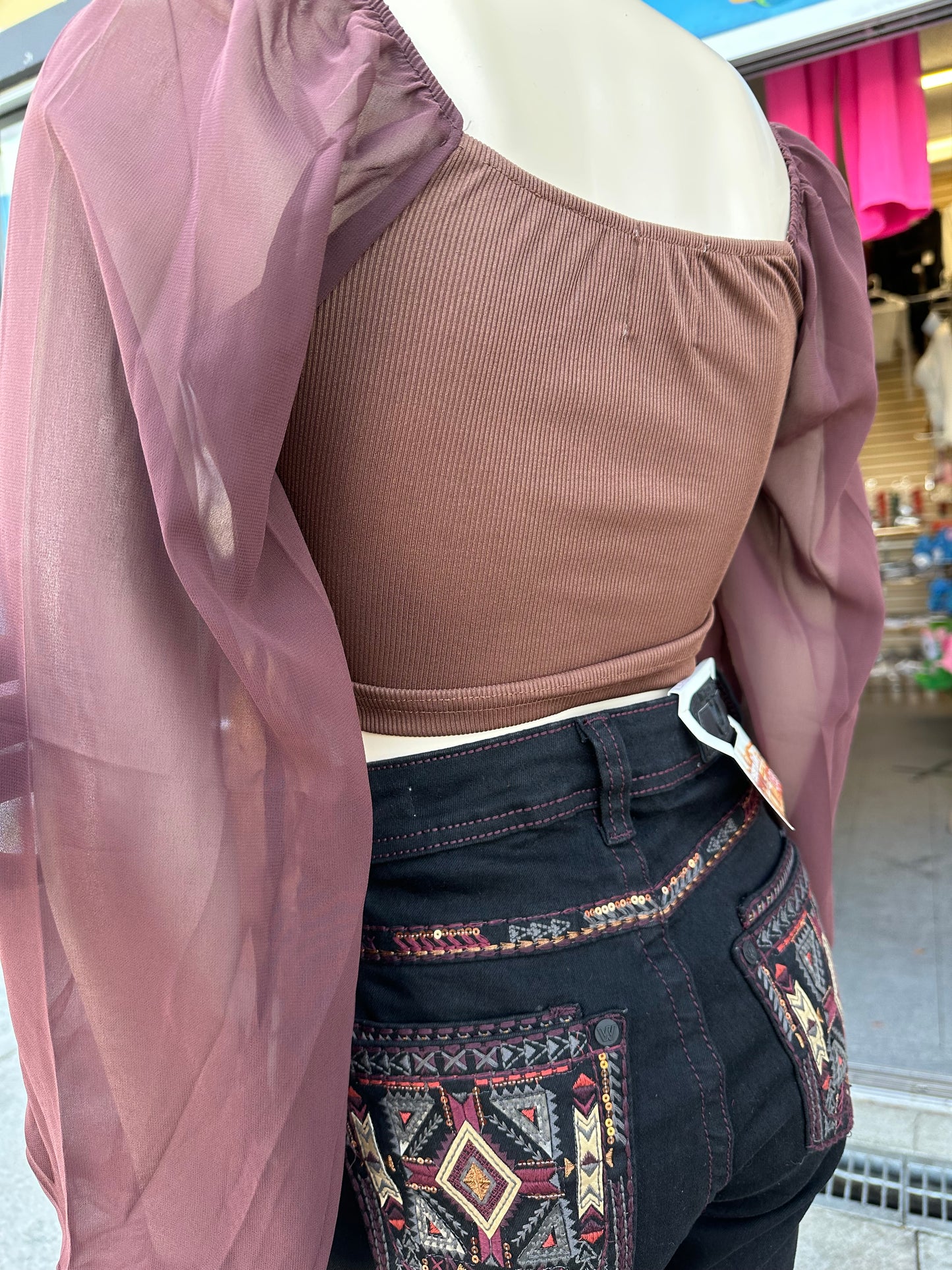 Nayeli’s brown top